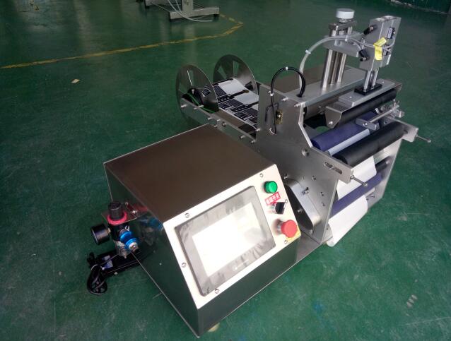 自动圆瓶贴标机